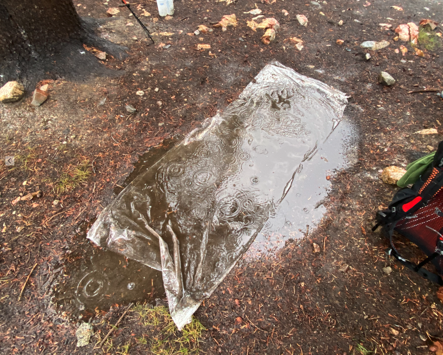 My ground tarp after the overnight deluge on the evening of Day 12. I woke up floating in this, with everything around me completely soaked.